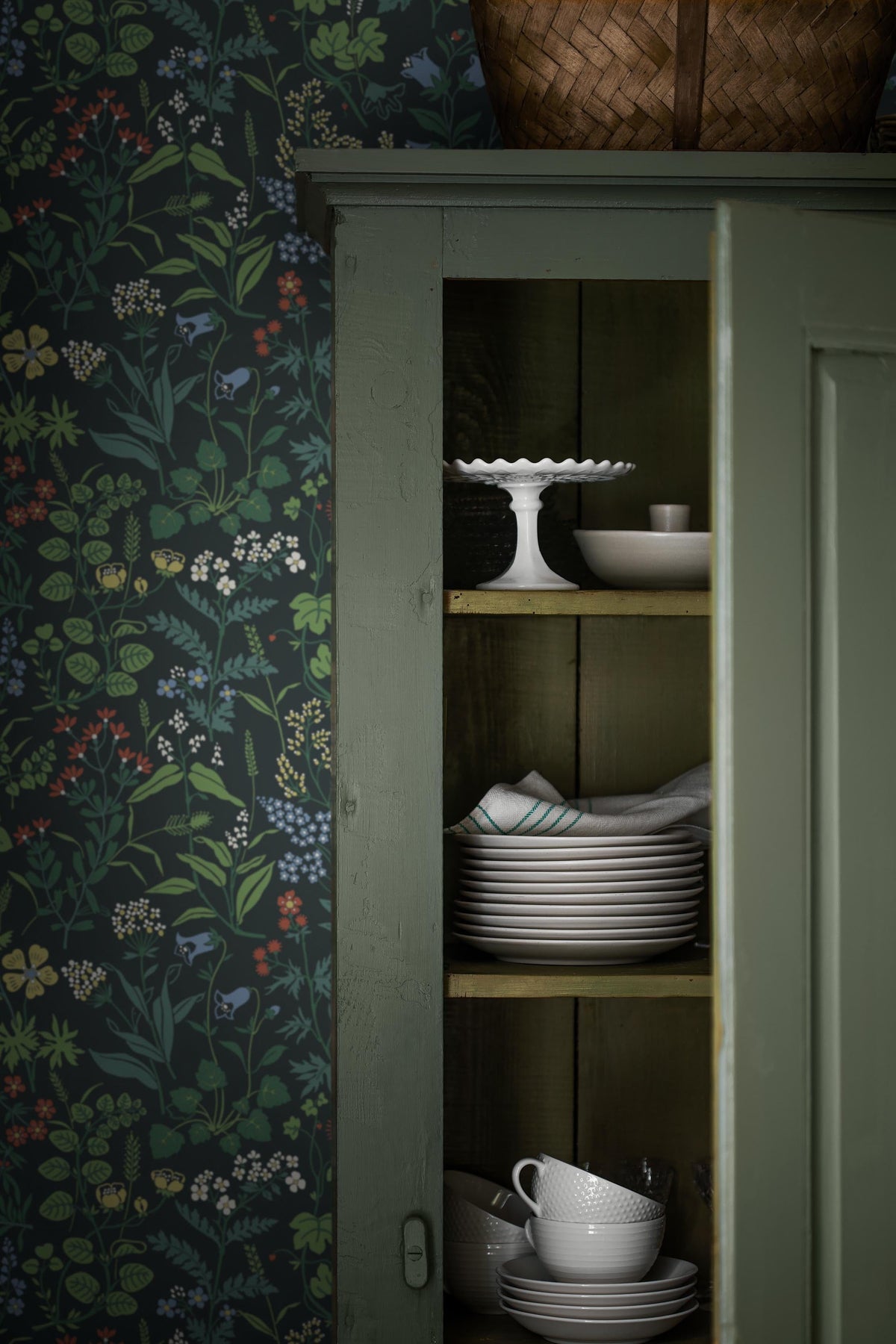 Flora wallpaper in Midnight Blue on a kitchen wall