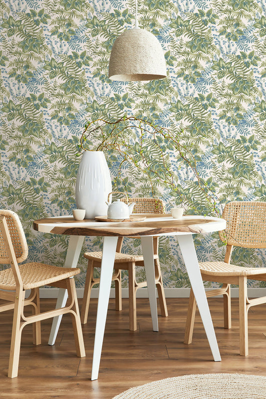 Rowan wallpaper in Cream/Sky Blue on a feature wall, dense hand-painted foliage