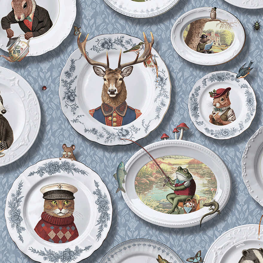 Blue wallpaper hung with white china plates holding animal portraits — flat pattern detail