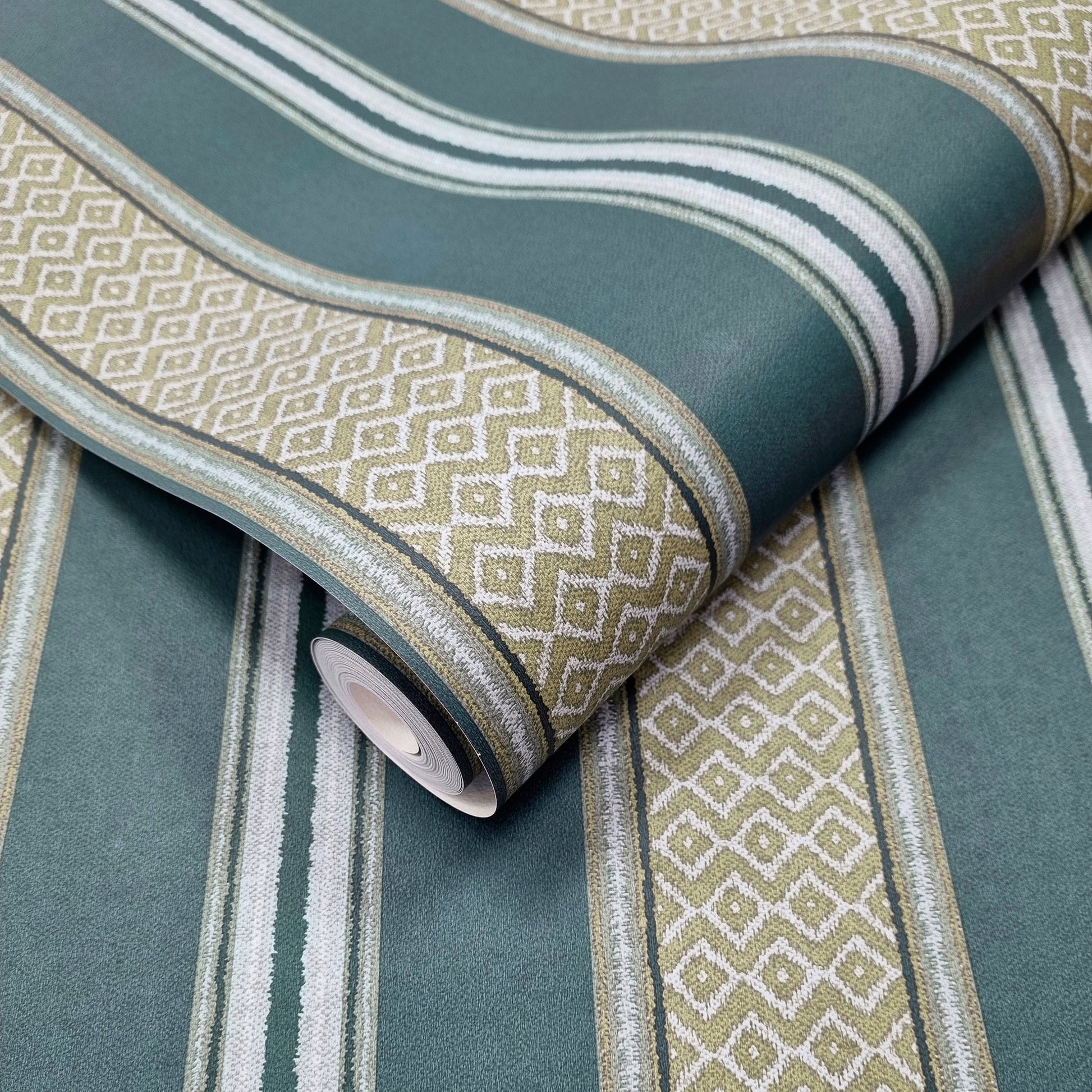 Patola Dark Teal wallpaper roll showing the woven-stripe repeat