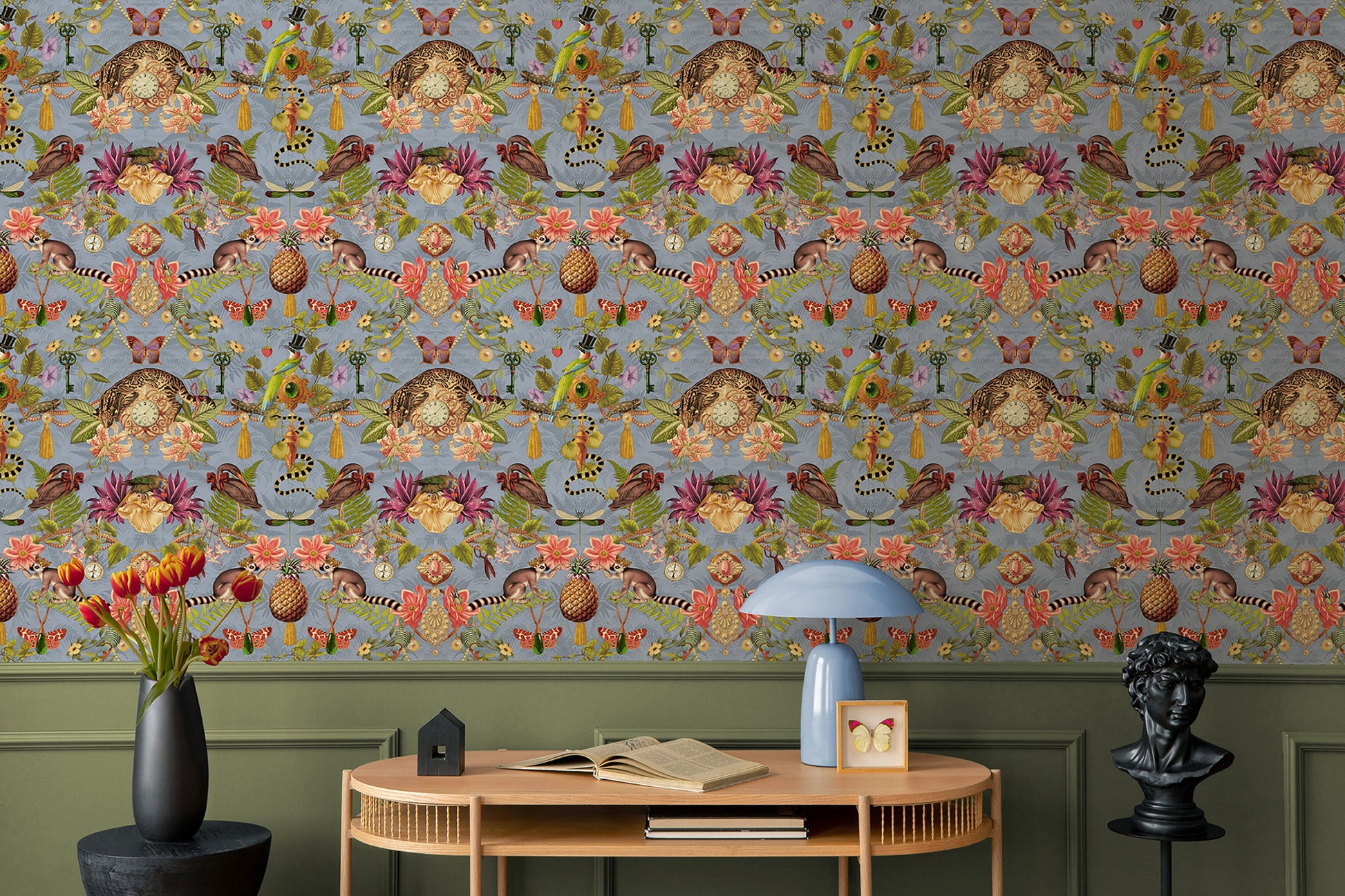 Bohème wallpaper in Sky Blue on a feature wall, showing the mirrored curiosity-cabinet pattern