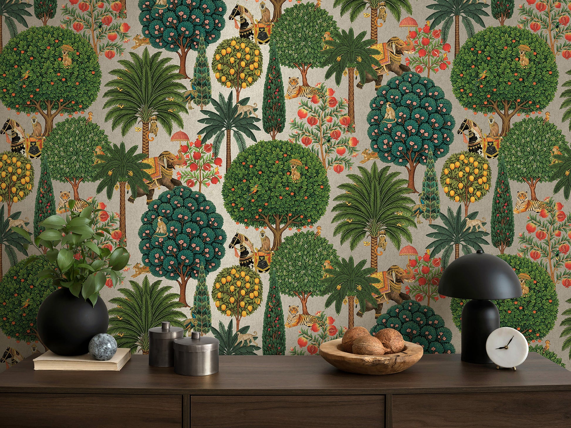 Bengal wallpaper in Pewter on a feature wall, jewelled animal motifs among leaves