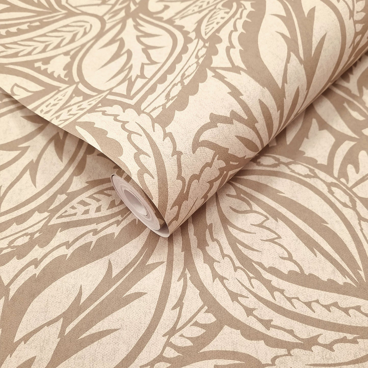 Musa Beige wallpaper roll showing the abstract leaf repeat