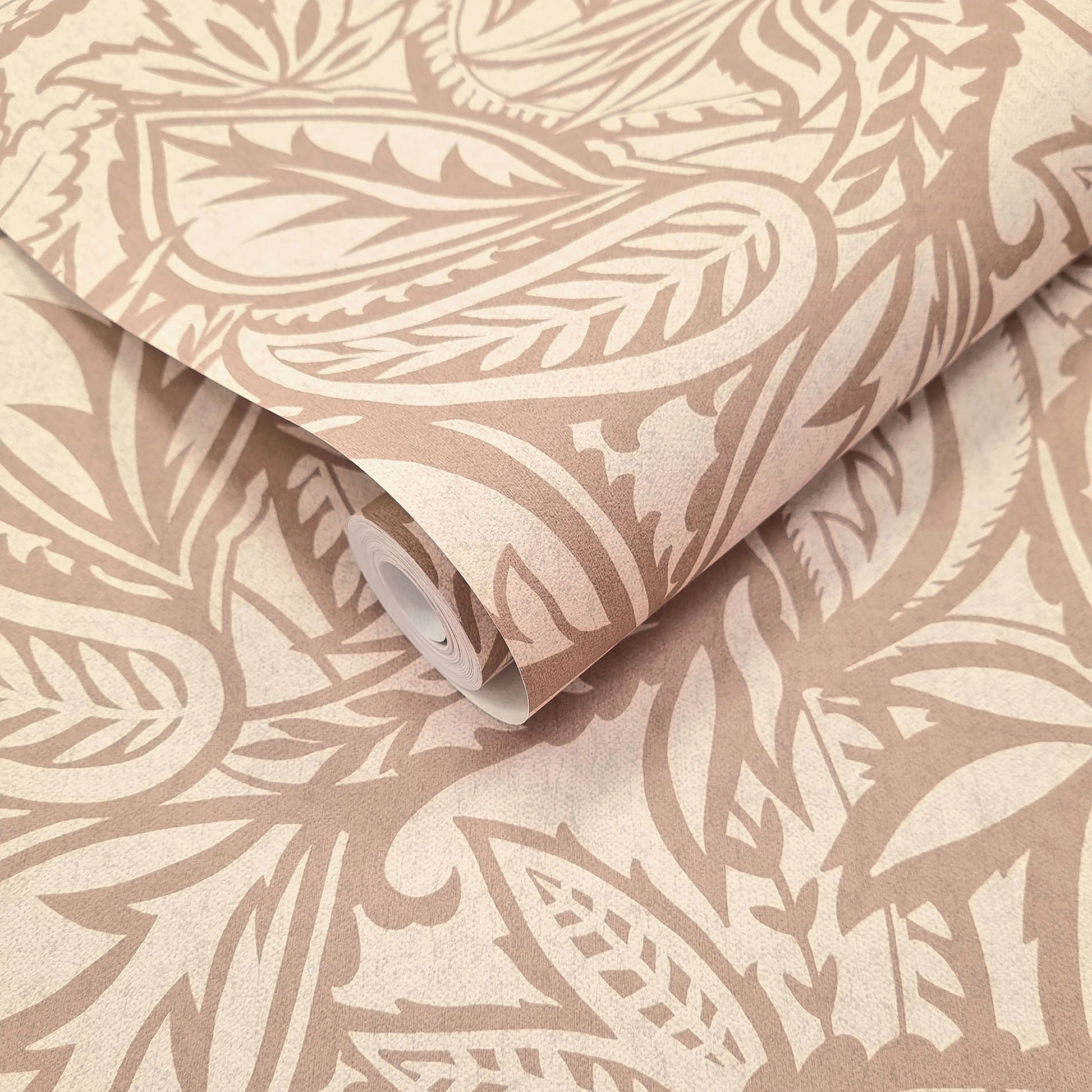 Musa Blush wallpaper roll showing the abstract leaf repeat