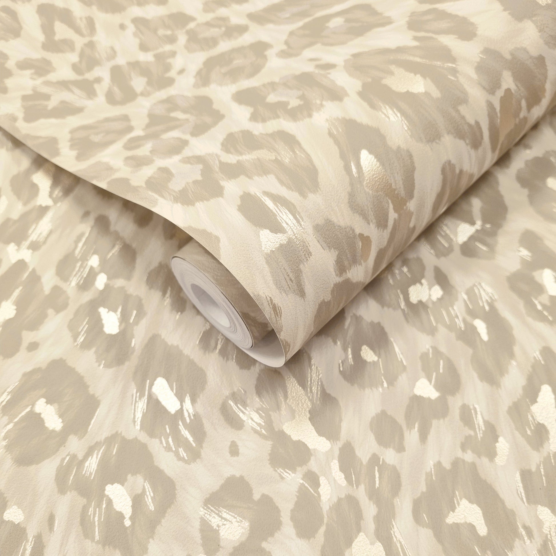 Rosette Champagne wallpaper roll showing the leopard-print repeat