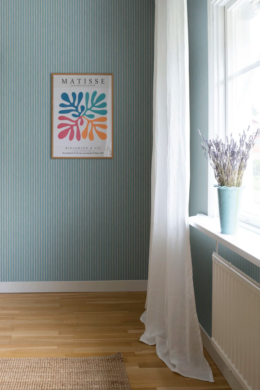 Brita Stripe Wallpaper - Sky Blue in a styled room