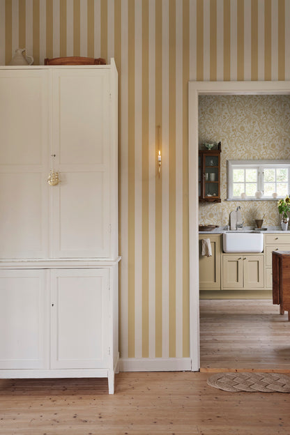 Sam Narrow Striped wallpaper in Honey in a room setting