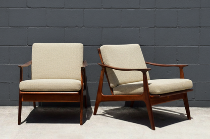 Danish armchairs in Ovis Ecru with dark charcoal brick wall