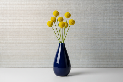 Navy vase with lustrous silver wallpaper