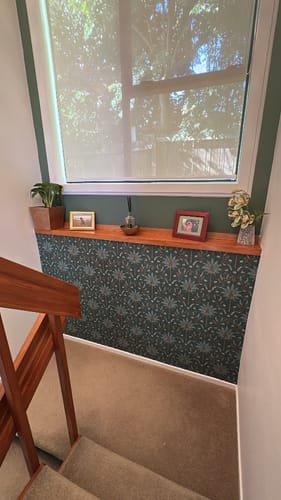 My first solo attempt at wallpapering...  So easy to hang. 