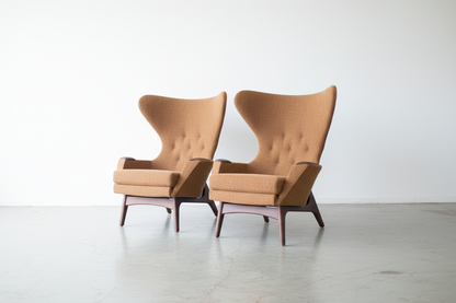 Photorealistic wingback chairs in Pelle Tan on concrete