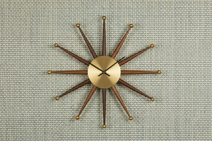 Product shot with mid-century clock and Sage Blue Metallic Turquoise grasscloth